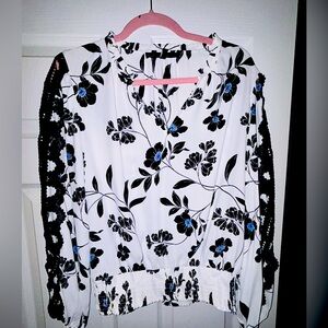 White House Black Market floral blouse. Size small
